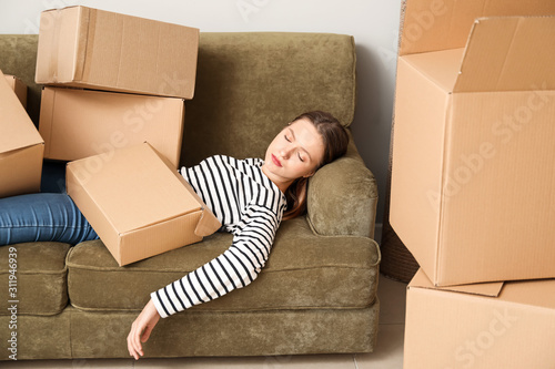 Exhausted woman sleeping on...