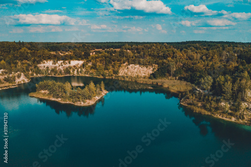 Fantastically beautiful landscape of basalt columns and azure lake in Ukraine.