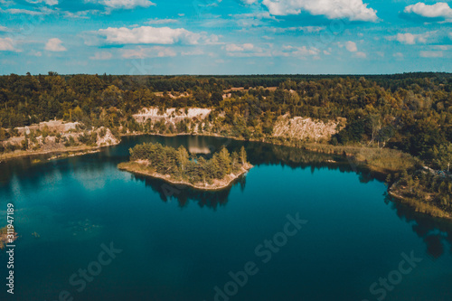 Fantastically beautiful landscape of basalt columns and azure lake in Ukraine.