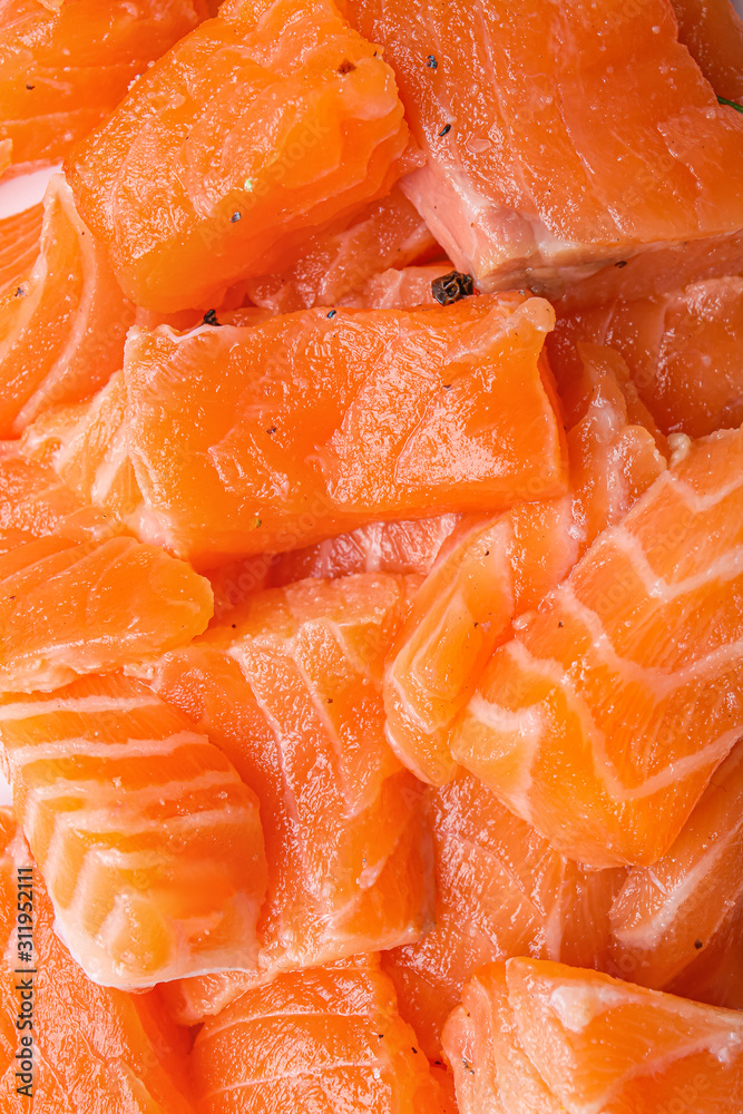 Pieces of fresh raw salmon as background Pieces of fresh raw salmon as background