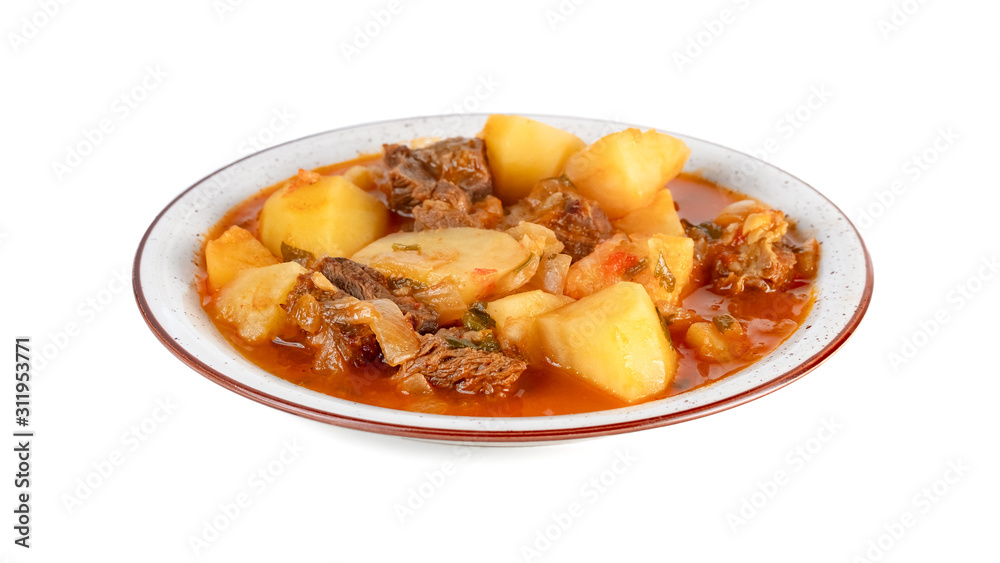 Tasty winter stew with meat and vegetables on a plate. white background Tasty winter stew with meat and vegetables on a plate. white background