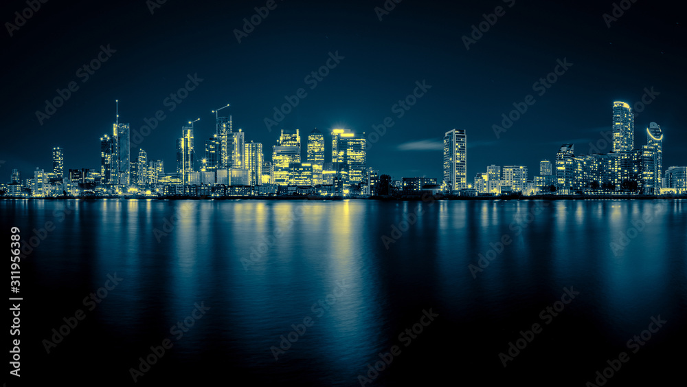 Night Time Skyline View of Modern Business District Canary Wharf in London