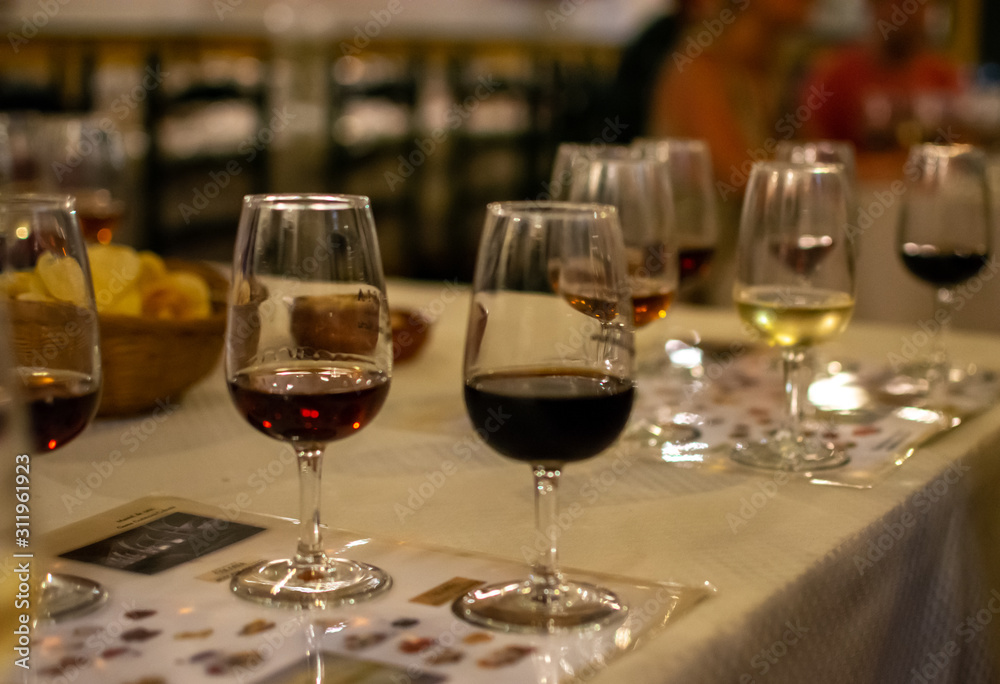 Sherry wine tasting, selection of different jerez fortified wines from dry to very sweet in glasses, Jerez de la Frontera, Andalusia, Spain