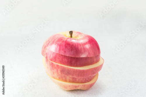 A sliced apple isolated on  white background.