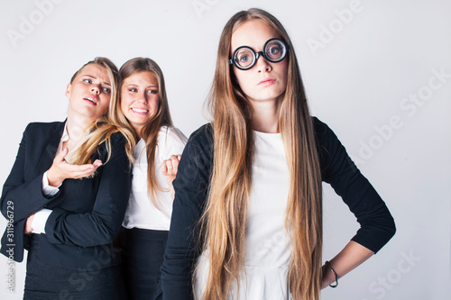 new student bookwarm in glasses against casual group on white background, teen drama, lifestyle people concept photo