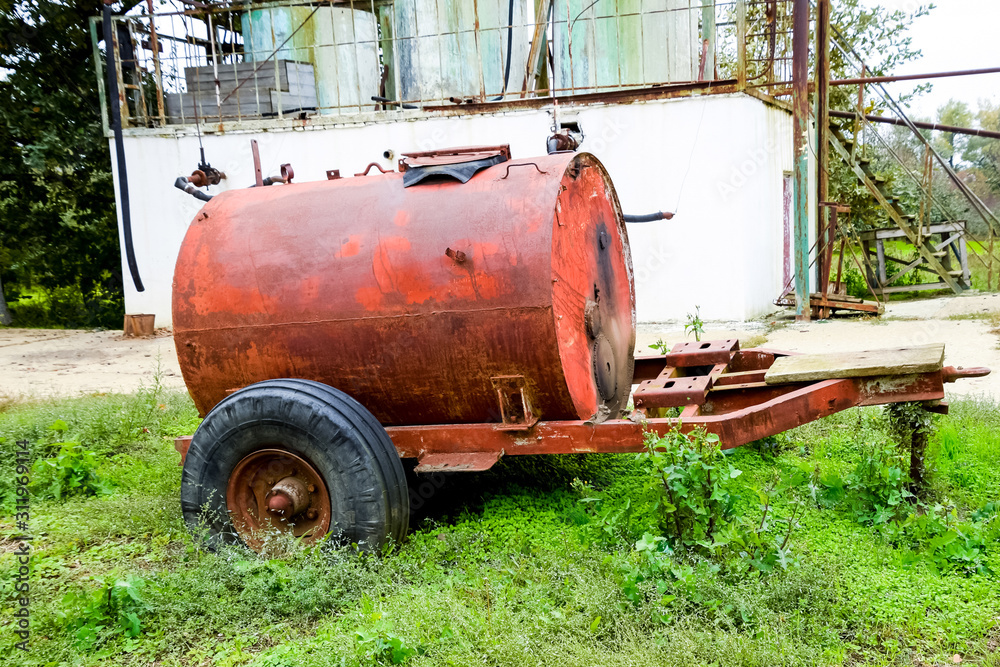Station for refueling fertilizers. A stationary garden station w Station for refueling fertilizers. A stationary garden station w