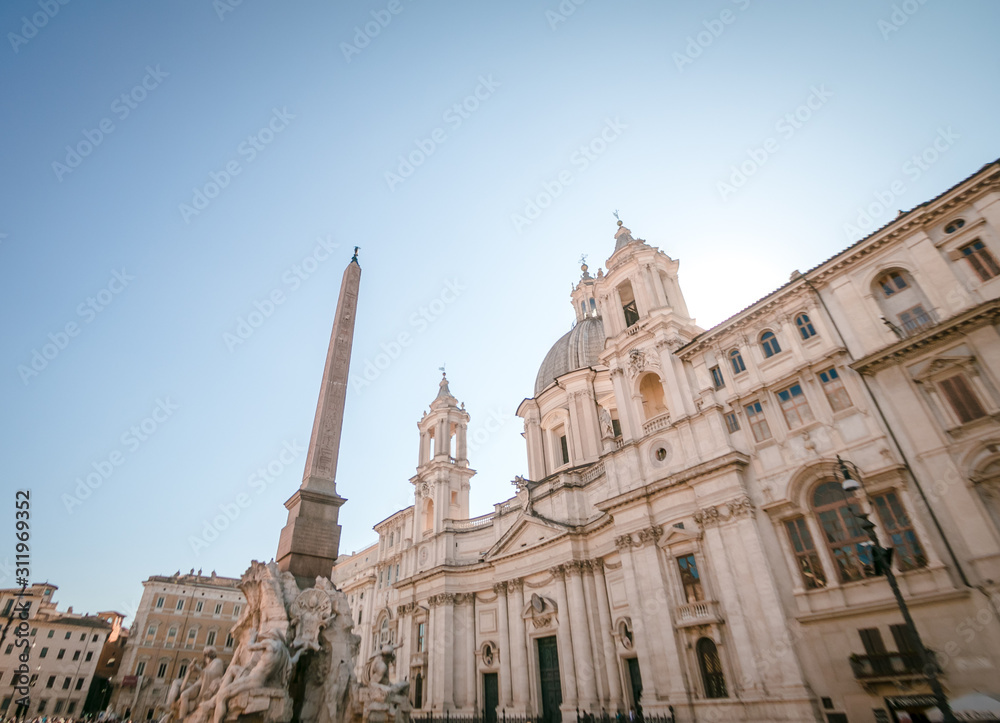 Navona Square (Piazza Navona) with the Fountain of the Four Rivers and The Sant'Agnese in Agone Church in the background, Rome, Italy