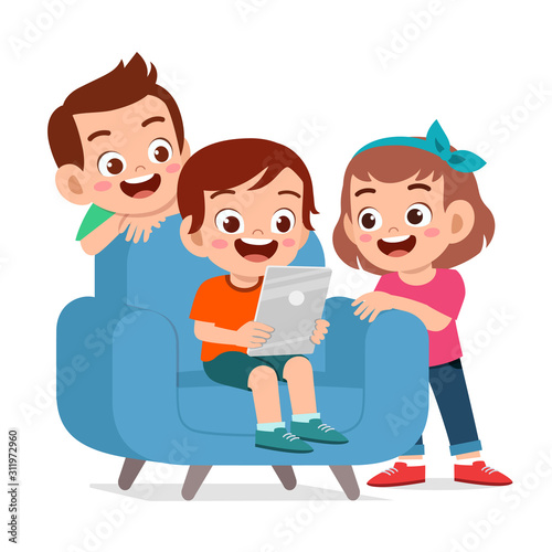 happy cute kid boy and girl play with tablet