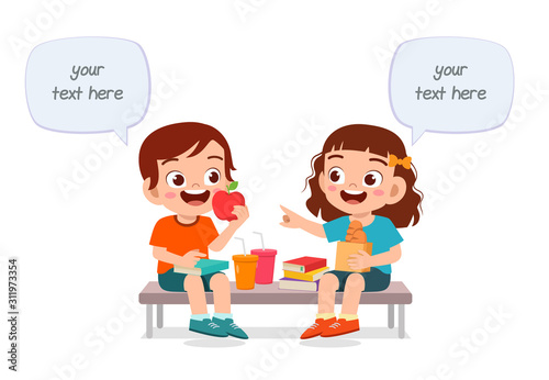 happy cute kids boy and girl eat together