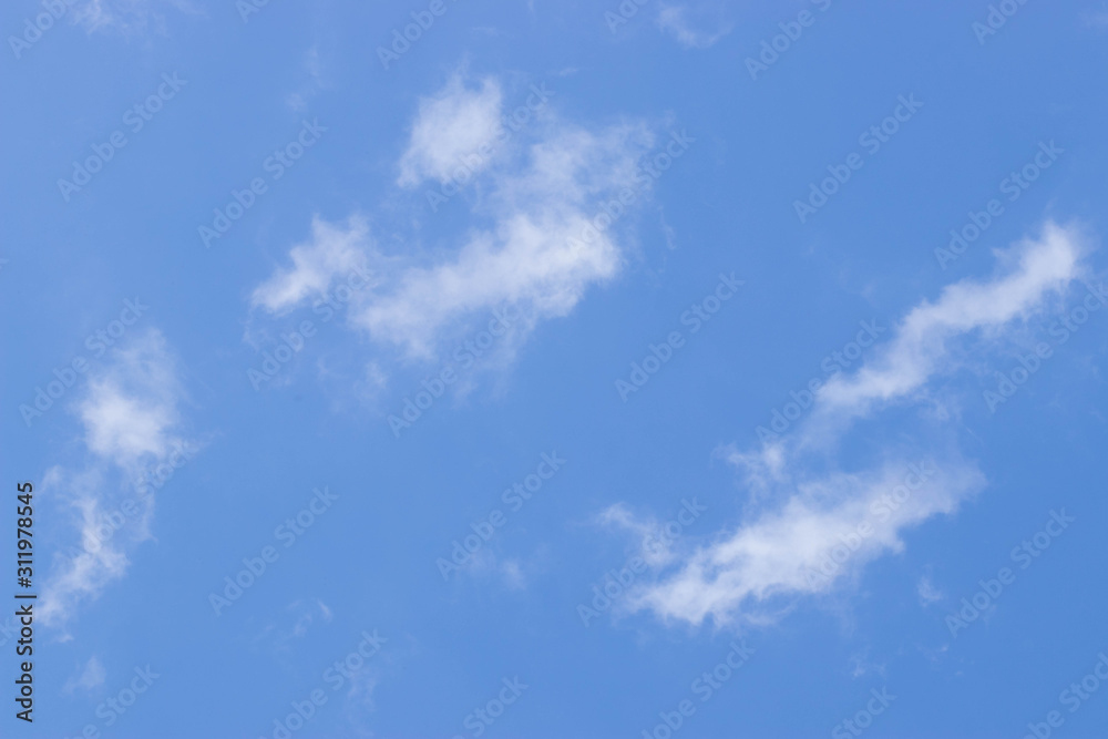 Balanced shot of clouds in a blue sky Balanced shot of clouds in a blue sky