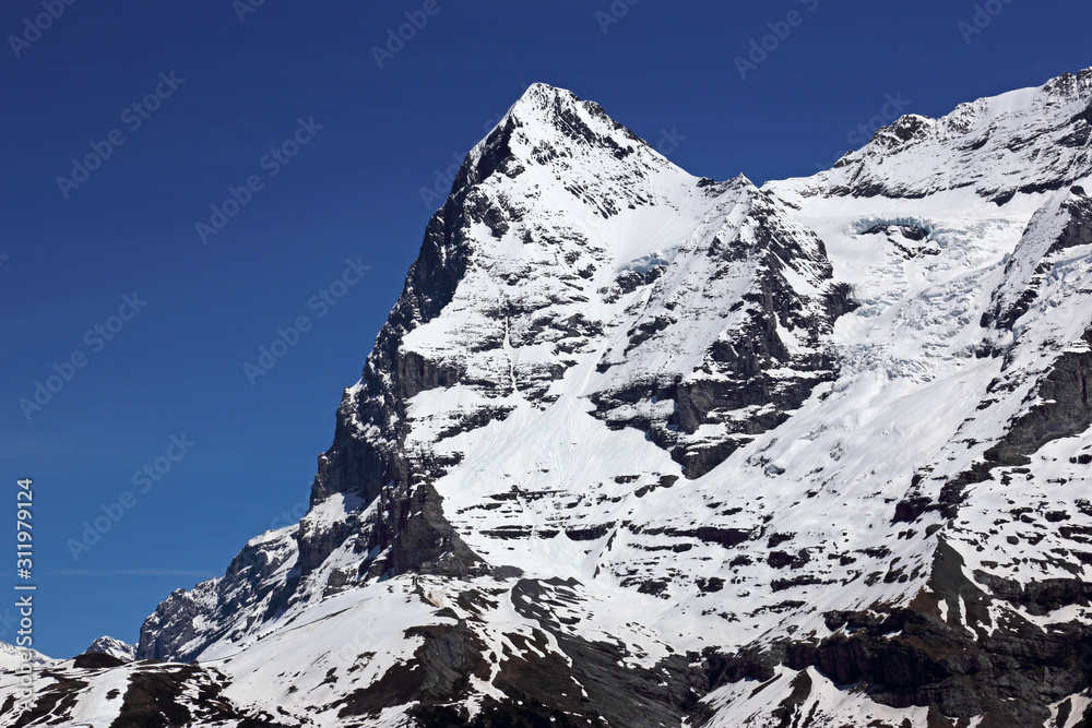 The western face of the Eiger mountain of the Swiss Alps, shot from Murren, Switzerland.