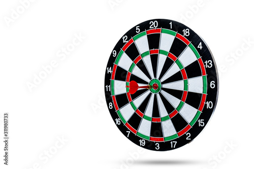 Red dart arrow hitting in the target center is Dart board Isolated on White background