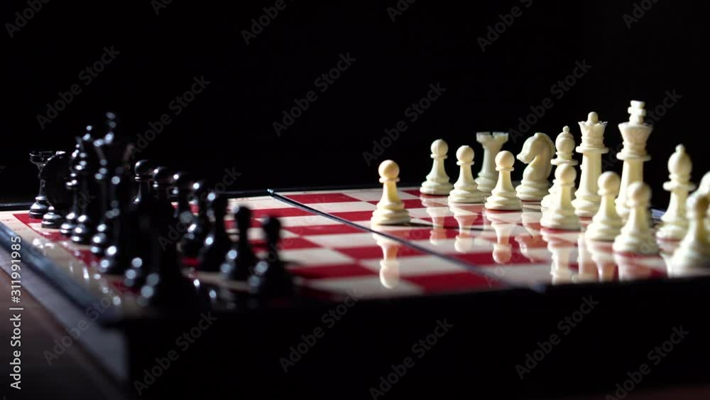 White first move e4 with eye level smooth rotating shot of chessboard in dramatic lighting with full pieces on white and black sides - 4K