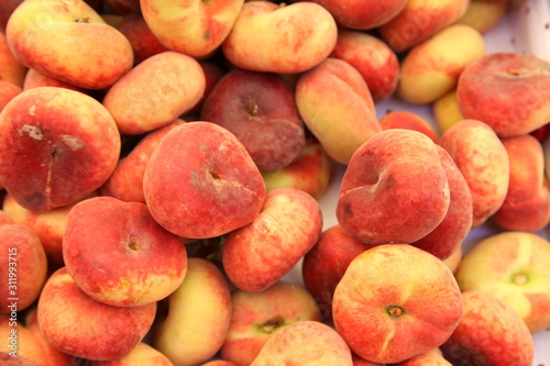 fresh ripe peaches on market