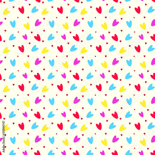 Seamless pattern background with colorful hearts on white background.