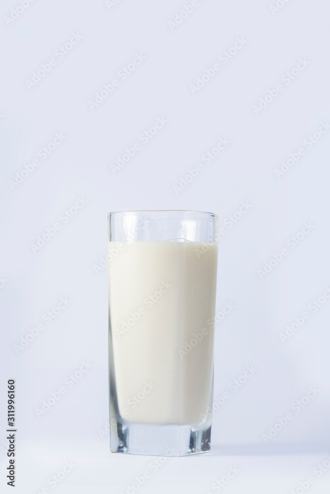 A glass of milk or a glass of soy milk isolated on a white background A glass of milk or a glass of soy milk isolated on a white background