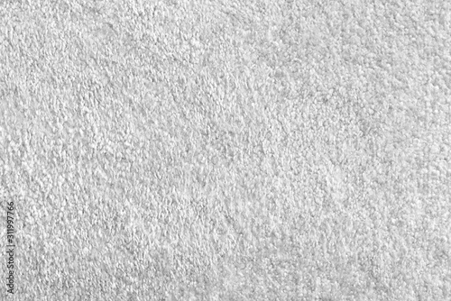 The texture of the light gray carpet is a synthetic carpet. Light carpet texture pattern design photo