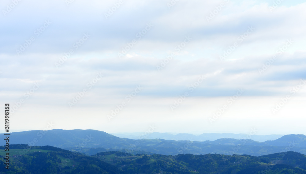 Picturesque landscape with hills and blue air, the atmosphere in the European forest of Schwarzwald,, Germany. Clean Air Ecology Concept