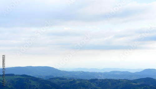 Picturesque landscape with hills and blue air, the atmosphere in the European forest of Schwarzwald,, Germany. Clean Air Ecology Concept © pridannikov
