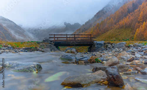 Bridge in front of the Alps