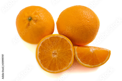 Oranges isolated on a white background. Fresh citrus fruits.