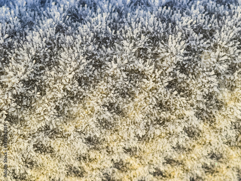 Background of a sheet of slate covered with frost