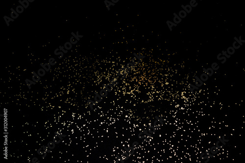 Golden shiny background of sparkles.