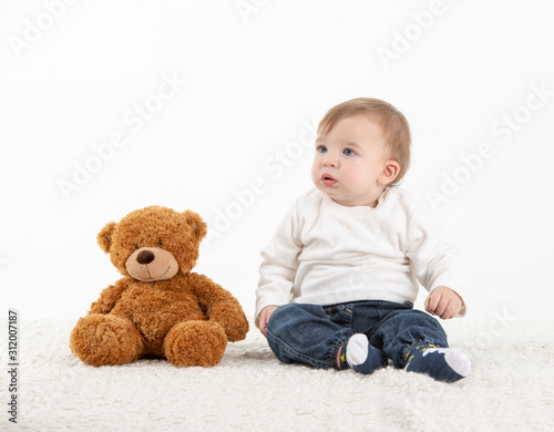 Baby with a teddy bear
