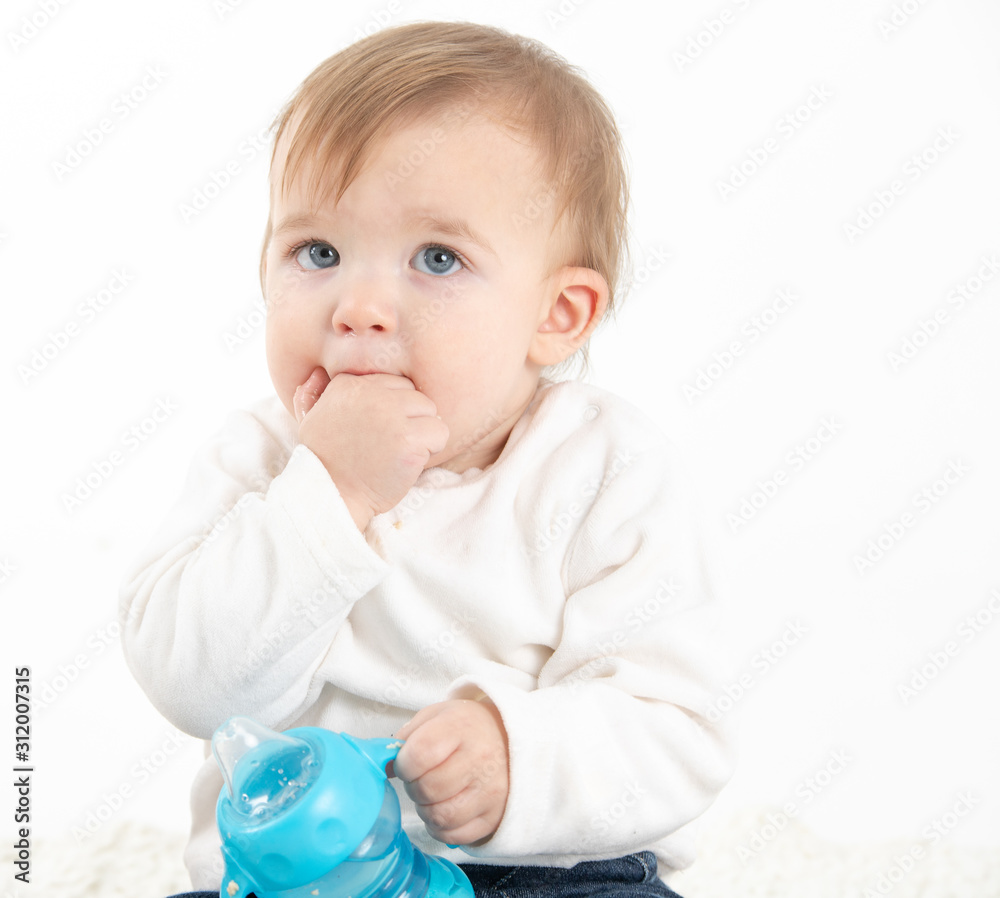 Baby with a canteen with handles Baby with a canteen with handles