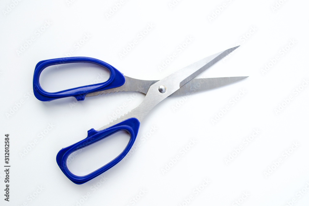 Blue scissors isolated on a white background. Blue scissors isolated on a white background.