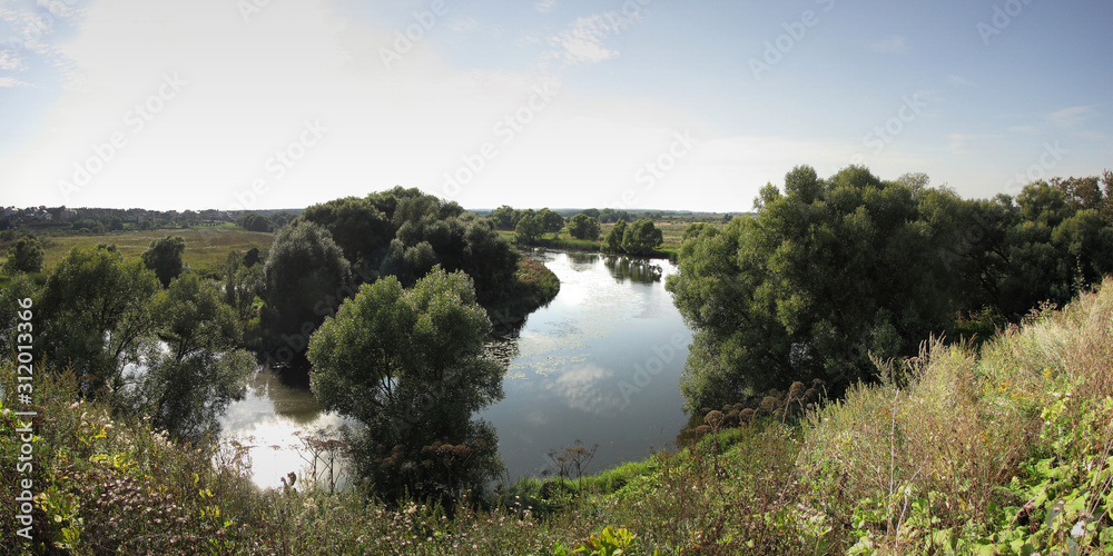 Fototapeta premium Fishing on the river, beautiful panorama.