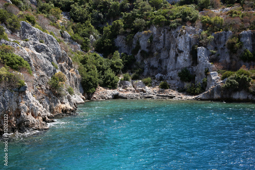 Little blue bay and the rocky coast of Kekova island in Turkey. © Ihor95