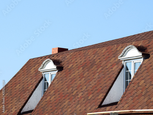 House with a roof made of metal sheets