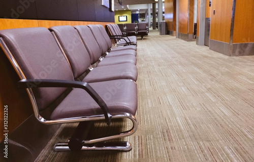 Leather chairs along wall in waiting room
