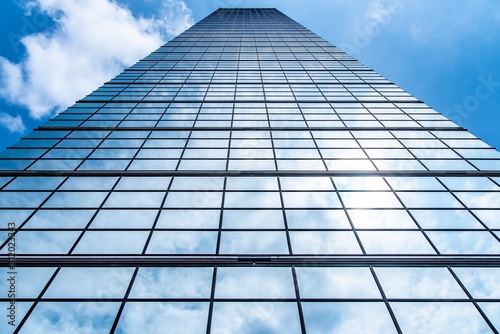 modern building with blue sky and clouds