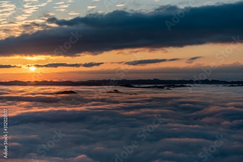 Sea of ​​clouds and sunrise