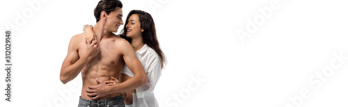 panoramic shot of beautiful sexy young happy couple hugging, isolated on white