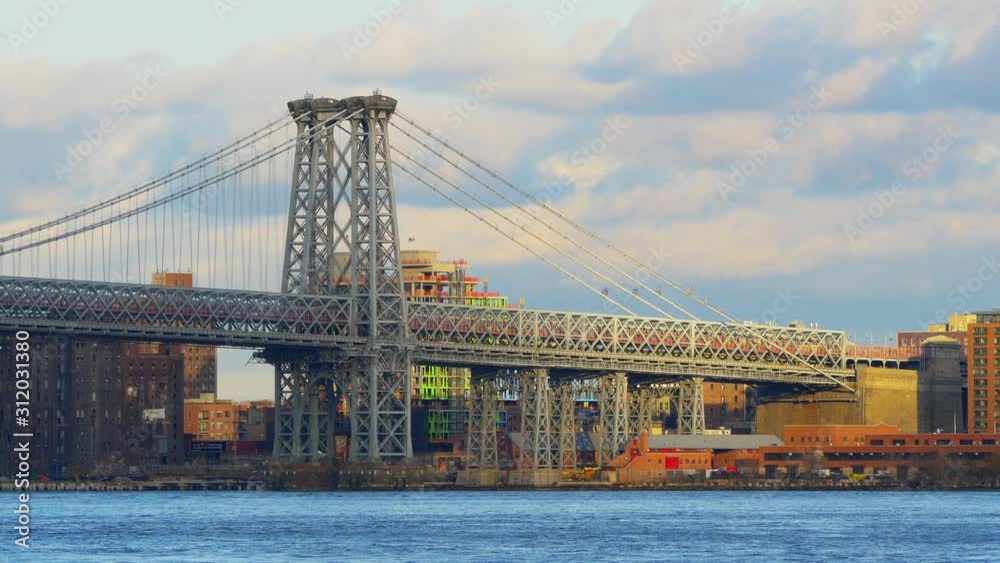 Telephoto shot of Williamsburg bridge at cloudy weather, New York City, USA Telephoto shot of Williamsburg bridge at cloudy weather, New York City, USA