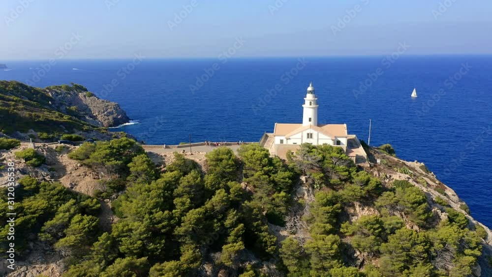Aerial view, flight over the Faro Capdepera lighthouse, Bay of Cala Gat, Cala Ratjada region, Mallorca, Balearic Islands, Spain Aerial view, flight over the Faro Capdepera lighthouse, Bay of Cala Gat, Cala Ratjada region, Mallorca, Balearic Islands, Spain
