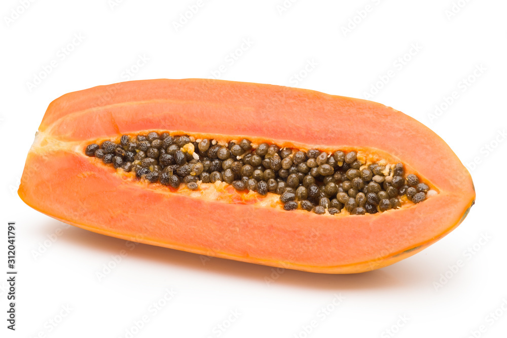 Ripe papaya varieties from Holland, cut in half with seed on white background with clipping path. Ripe papaya varieties from Holland, cut in half with seed on white background with clipping path.