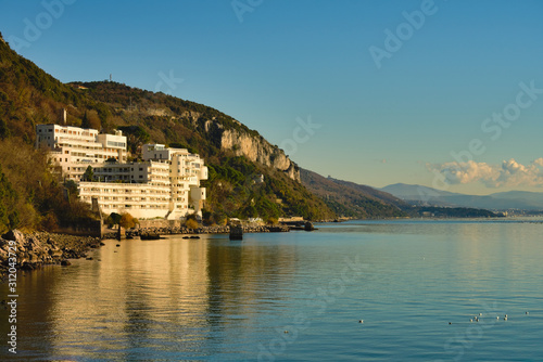 White building facing the Adriatic sea on the Mediterranean coast of Aurisina near Trieste in Italy