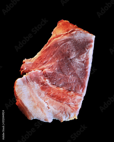 Sliced ​​Bacon. Thin strip of pork bacon for your design. Isolate on a black background.