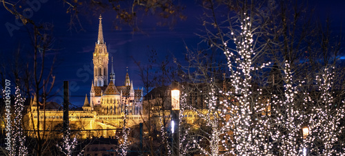 View on the famous Fishermen's Bastion in Budapest in winter with christmas l...