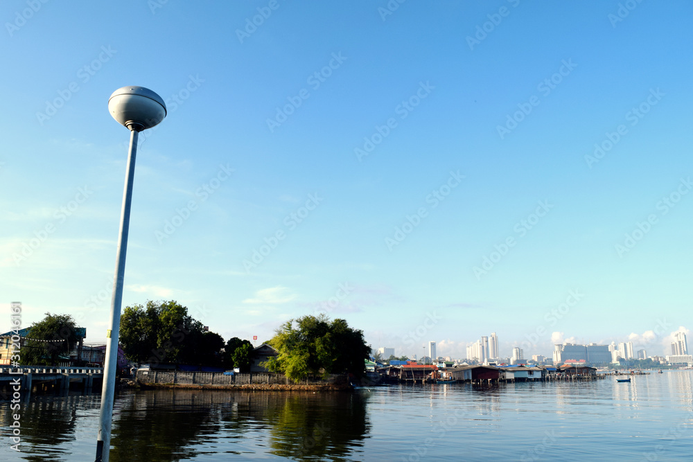 A picture of a beautiful landscape, corner of the sea and the community of Pattaya, Thailand.