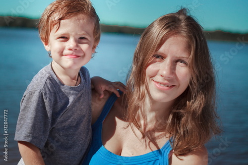 mother and son together at the beach portrait retro and vintage © Neira