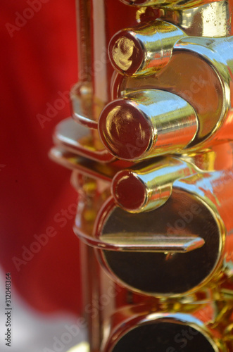 A Toy Gold plastic Saxophone