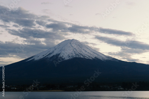 blur Fuji mountain with snow cap and blue sky background