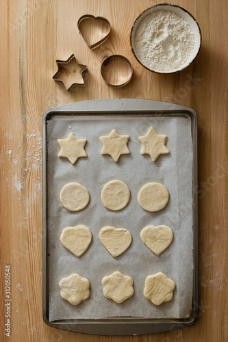 Preparing homemade star-shaped cookies, top view