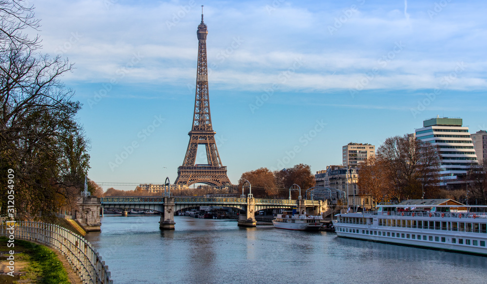 Eiffel tower and Seine with clouds