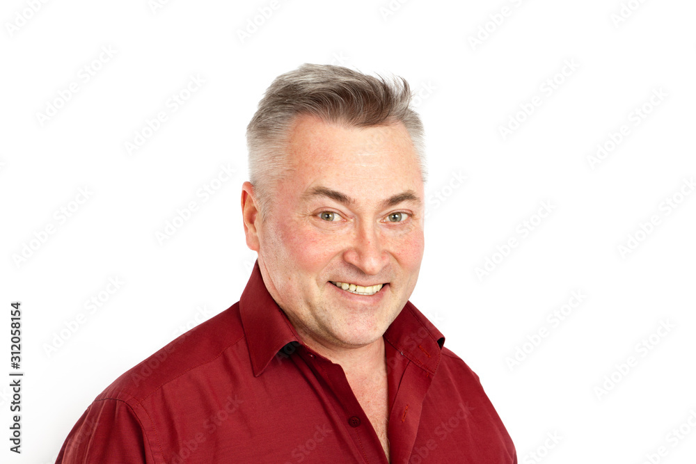 A gray-haired elderly man in a red shirt smiling portrait isolated on white A gray-haired elderly man in a red shirt smiling portrait isolated on white